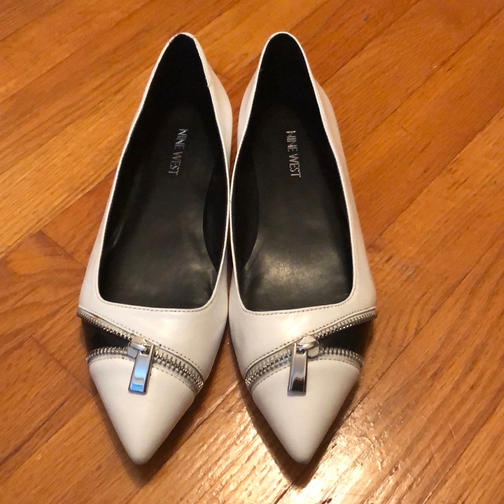 White Nine West flats with zipper